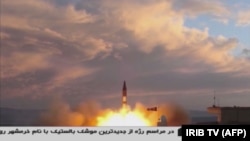 A TV grab taken on September 23, 2017 from the Iranian Republic Islamic Broadcasting (IRIB) shows a Khoramshahr missile being launched from an undisclosed location.