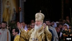 Russia -- Patriarch Kirill (C) conducts an Orthodox Christmas service at Christ the Savior cathedral in Moscow, January 6, 2015