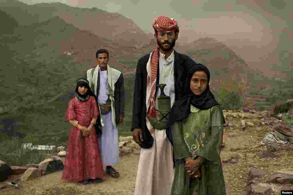 Stephanie Sinclair of the United States won a prize for her series &quot;Child Brides: Too Young To Wed.&quot; In this photo from Yemen, the girl dressed in pink was 6 years old when she married her husband.