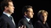 საფრანგეთი: პრეზიდენტი ნიკოლა სარკოზი (ცენტრში) დოვილის სამიტის დანარჩენ მონაწილეებთან ერთად