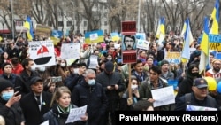 Demonstrators take part in an anti-war protest in support of Ukraine in Almaty on March 6.