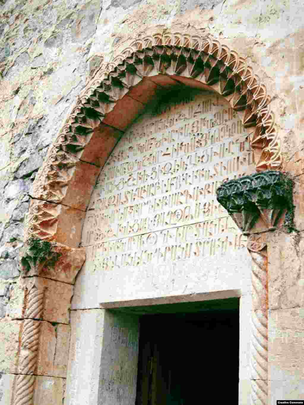Armenian script towers over the door at an entrance to the Yeritsmankants monastery. The partially ruined monastery was built in 1691. 