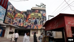 Pakistani moviegoers visit Zila Ghaziabad an Indian movie starring Bollywood star Sanjay Dutt at a cinema in Lahore.