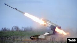 A TOS-1A Buratino multiple rocket is launched during a military drill at the Prudboi training ground in Russia's Volgograd region. (file photo)