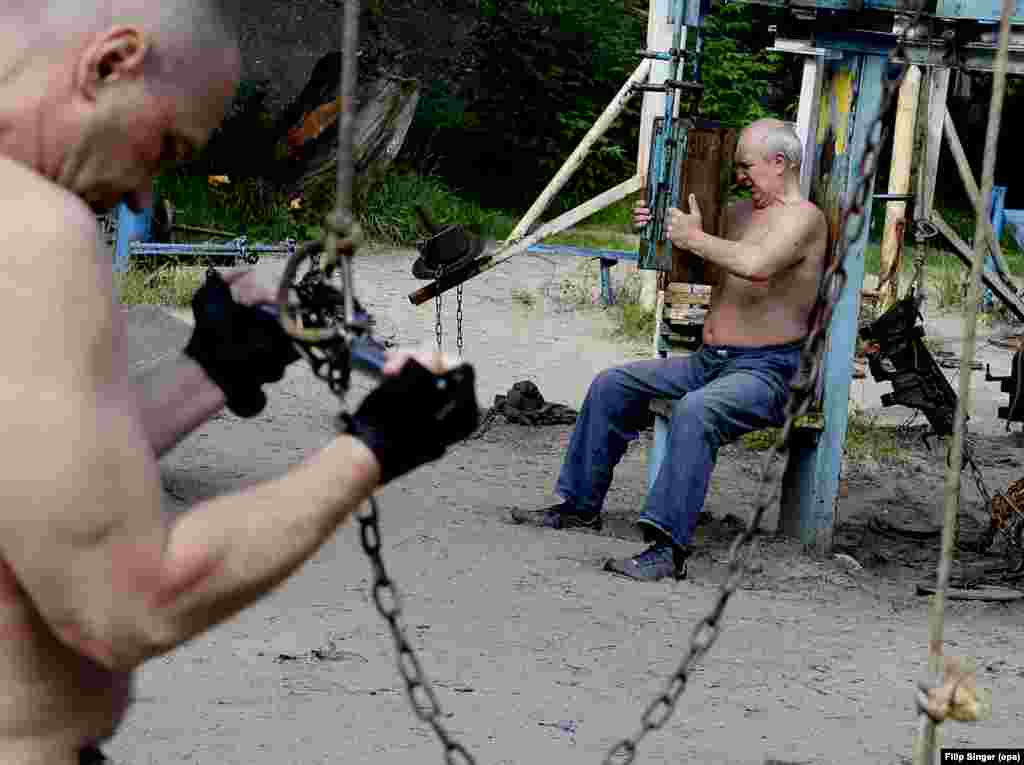 Elderly locals grinding through reps. One of the attractions of the outdoor gym is the freedom for people to wander through the trees and throw themselves in the river after a heavy workout.&nbsp;