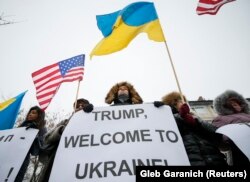 Demonstrators outside the U.S. Embassy this morning in Kyiv, where many are hoping for increased Western support for Ukraine to reestablish peace and recover Crimea, which was forcibly annexed by Russia in 2014.