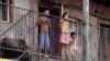 Slovakia - Romany kids in the Angi Mlyn neighborhood in Michalovce, eastern Slovakia. Roma gypsies children screen grab
