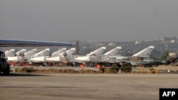 Russian fighter jets on the tarmac at the Russian Hmeimim military base in Syria's Latakia Province in February