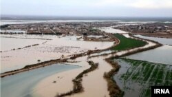 An aerial view of large swaths of land flooded in Iran's oil-producing Khuzestan province. April 5-6, 2019