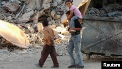 Дети среди руин в окрестностях Дамаска. Иллюстративное фото. 
