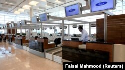 The check-in area as shown during a media tour of the new airport