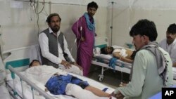 A wounded men receives treatment in a hospital after a suicide attack on the outskirts of Jalalabad city east of Kabul, on June 13.