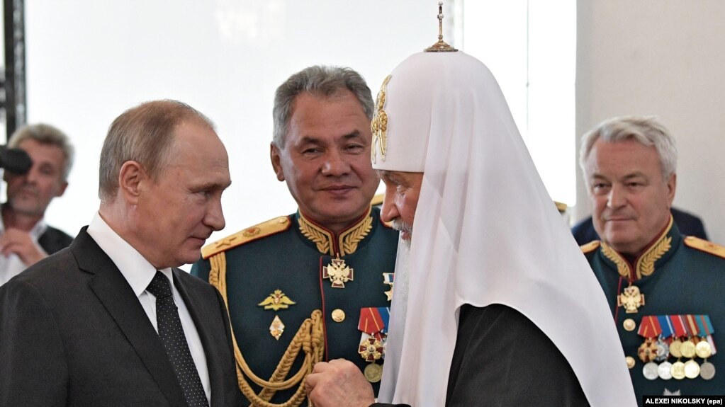 Зліва направо: російський президент Володимир Путін, міністр оборони Росії Сергій Шойгу і Московський патріарх Кирило (архівне фото)