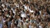 Worshipers shout slogans during the Friday Prayer ceremony in Tehran