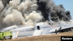 U.S. - Asiana Airlines Boeing 777 is fully engulfed on the tarmac after crash landing at San Francisco International Airport in San Francisco, California on July 6, 2013