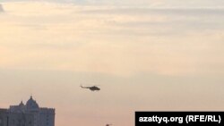 Helicopters rides above sky in Aqtobe on June 5.