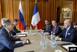 Переговори французької та російської делегацій на чолі з Лораном Фабіусом та Сергієм Лавровим