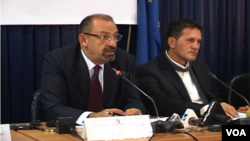 Dino Asanaj (left) was director of the board of the Kosovo Privatization Agency