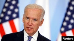 U.S. Vice President Joe Biden speaks to media after meeting with Polish leaders in Warsaw on March 18.