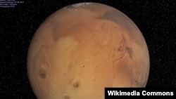 Mars planetinin teleskop vasitəsilə çəkilmiş fotoşəkili