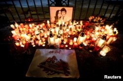 A memorial to Jan Kuciak and his fiancee, Martina Kusnirova