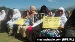 FILE: Family members of victims of enforced disappearances at a Pashtun Tahafuz Movement protest in Swat Pakistan in April 2018.
