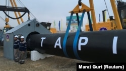 More than a year after Ashgabat announced its section of the TAPI natural-gas pipeline was done, state company Turkmengaz is still ordering sections for the project. (file photo)