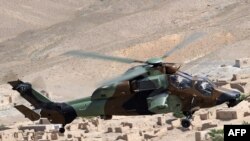 Residents of the Turkmen village of Marchak say that the sound of gunfire to the south in Afghanistan is becoming routine and that military helicopters have been regularly flying overhead as they apparently patrol the border (file photo)