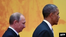 Президент США Барак Обама (справа) и президент России Владимир Путин.