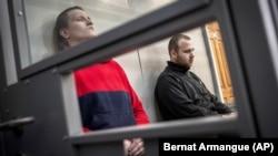 Російські військові Олександр Бобикін та Олександр Іванов на суді в Україні