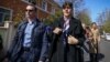 Laura Codruta Koevesi (right), former chief prosecutor of the National Anticorruption Bureau (DNA), arrives at a police station in Bucharest on March 29.