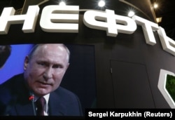 Президент Росії Володимир Путін на екрані відеостенду (архівне фото)