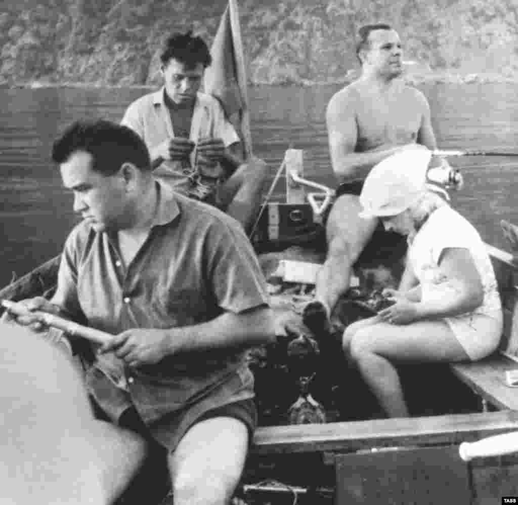 Soviet luminaries like cosmonaut Yury Gagarin, the first man in space, were also frequent visitors to Crimea. Here, Gagarin (smoking) and composer Aleksandra Pakhmutova (far right) during a fishing trip in the resort town of Hurzuf in June 1965. 