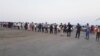 Residents for a human chain in Iran's Qeshm island to protest decision handing over tourism services to private sector. October 21, 2019