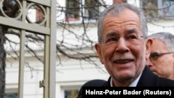 Alexander Van der Bellen, who is supported by the Greens, leaves a polling station in Vienna on December 4.