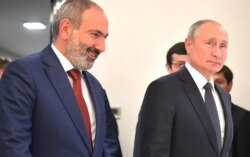 Armenski premijer Nikol Pašinijan (lijevo) i ruski predsjednik Vladimir Putin na sastanku u Jerevanu u oktobru 2019.