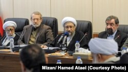 Iran Judiciary chief Sadegh Larijani who newly appointed as the head of Expediency Discernment Council (C), chairing a session of the council since his presidency, on January 19, 2019.