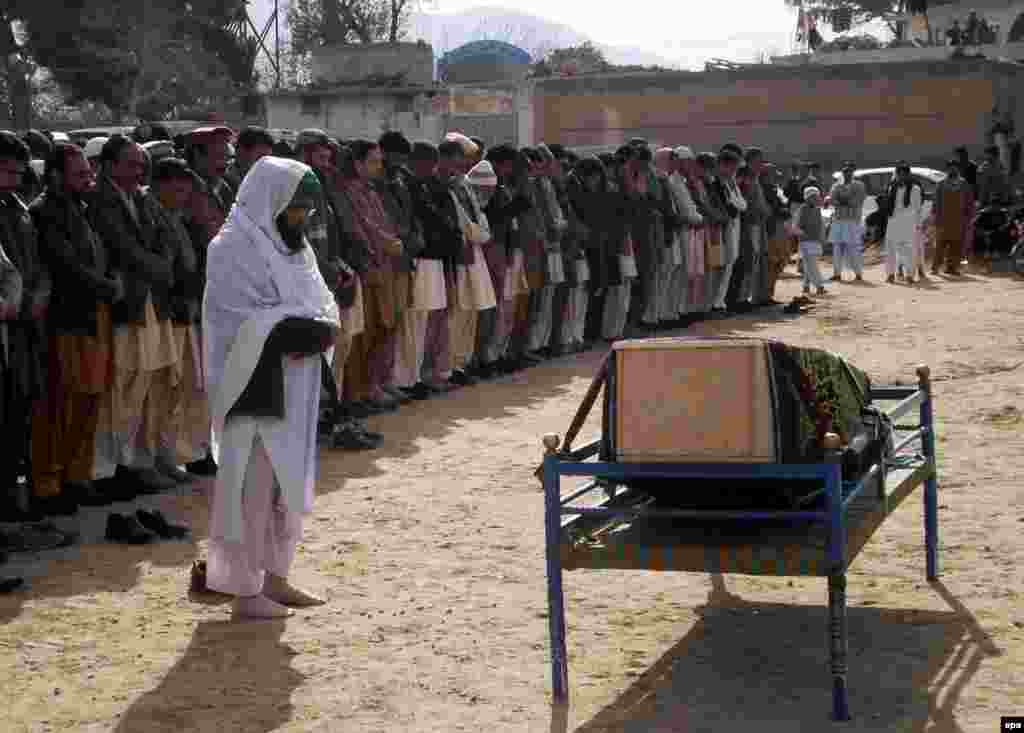 The funeral of a Pakistani journalist, Imran Sheikh, who was killed in twin bomb blasts in Quetta.