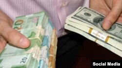 Manat və dollar