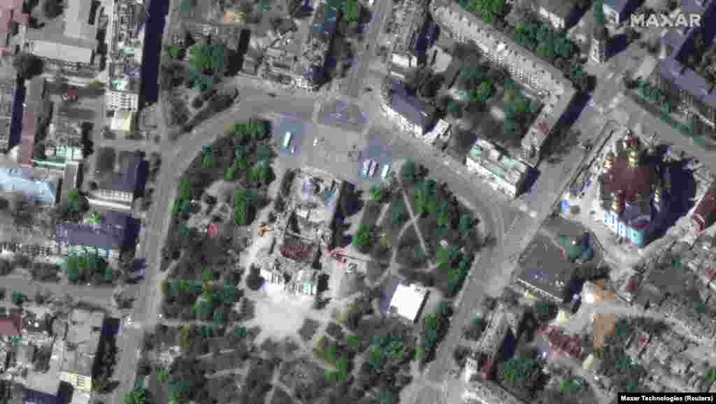 A satellite view of the theater after it was destroyed by a Russian air strike on March 16, 2022. Hundreds of people were reportedly sheltering in the building when the strike occurred.