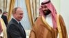 Russian President Vladimir Putin (left) and Saudi Crown Prince Muhammad bin Salman at the Kremlin.