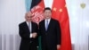FILE: Afghan President Ashraf Ghani with his Chinese counterpart Xi Jinping in Kyrgyzstan in June 2019.