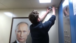 Putin Elevator Portrait Gets A Rise Out Of Riders
