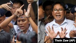 Gazetarët e Reuters Kyaw Soe Oo dhe Wa Lone, teksa dalin nga gjykata. 3 shtator, 2018.