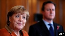 German Chancellor Angela Merkel (left) said national positions were "still quite apart."