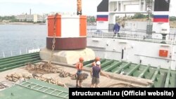 В Севастопольской бухте готовятся к параду кораблей, 14 июля 2018 года