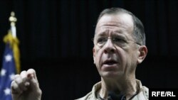 U.S. Joint Chiefs of Staff Chairman Admiral Mike Mullen talks with journalists during a press conference in Kabul on December 14.