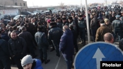 Armenia - Angry residents of Echmiadzin block a highway in protest against a Yerevan court's decision to release retired General Manvel Grigorian from pretrial detention, January 12, 2019.