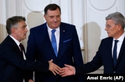 Članovi Predsjedništva BiH Željko Komšić (L), Milorad Dodik (C) i Šefik Džaferović (D), 16. novmebar 2018.