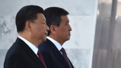Глава Китая Си Цзиньпин (на переднем плане) и президент Кыргызстана Сооронбай Жээнбеков.